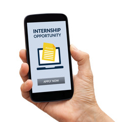 Hand holding smart phone with internship concept on screen