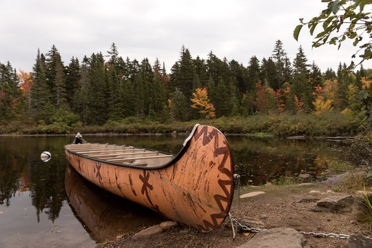 Canadian rabaska canoe on the Wapizagonke lake. Mauricie National Park. Quebec. Canada