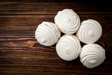  Russian marshmallow on dark wooden background.