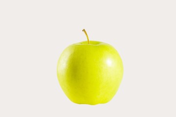 green ripe juicy Apple on a white background isolated