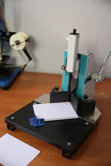 Part of printing machine for cutting cardboard in printing. Cutting, laminating machine