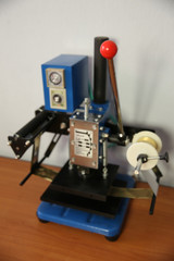 Part of printing machine for cutting cardboard in printing. Cutting, laminating machine