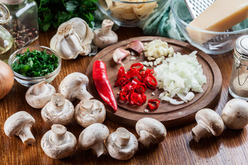 Ingredients ready for prepare tagliatelle pasta with champignon