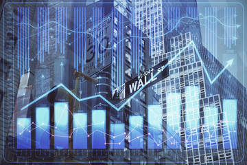Forex chart on cityscape with tall buildings background multi exposure. Financial research concept.