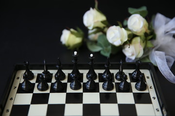 Chess board game concept of business ideas and competition and strategy ideas concep. Chess figures on a dark background 