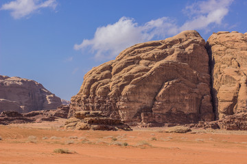 Fototapeta na wymiar Wadi Rum UNESCO world heritage famous touristic site desert landscape with sand stone rocky mountains picturesque scenic view