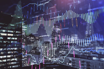 Financial graph on night city scape with tall buildings background multi exposure. Analysis concept.