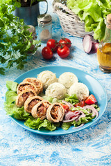 Pork rolls stuffed with mozzarella