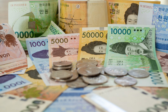 Korean won banknote and  Korean won coins for background image concepts.