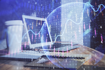 Financial graph colorful drawing and table with computer on background. Double exposure. Concept of international markets.
