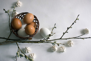 Happy Easter on a white background. Easter decor. Flat lay. Top view.