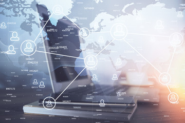 Computer on desktop with social network theme icon. Multi exposure. Concept of international connections.