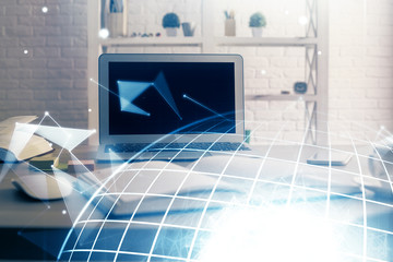 Multi exposure of table with computer and world map hologram. International data network concept.