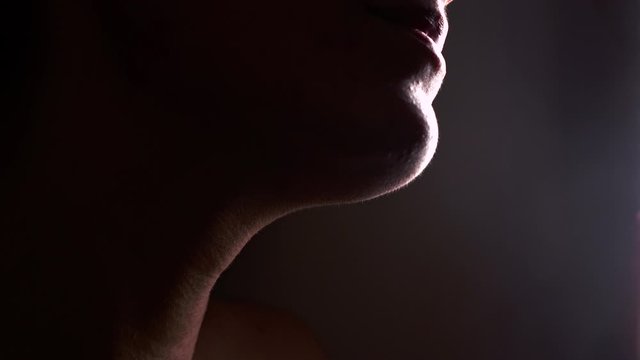 Skin problem - Young Woman who suffers severe acne - Macro - At the end of the video, she turns her head.