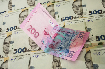 Ukrainian hryvnia for the background.