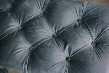 Gray upholstery furniture. Textured texture. Fabric for furniture