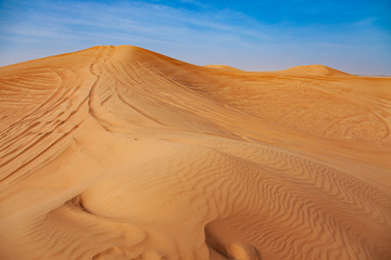 Red Sand Desert Barchan and Blue Sky Lanscape