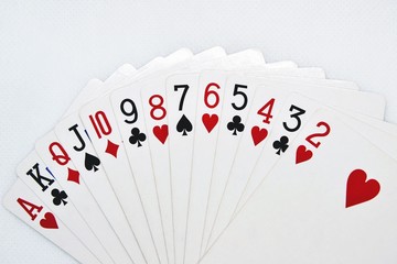 Obraz premium Close up of playing cards. Set of playing cards in order As to Two. White background