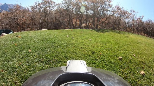 Point of view from robotic lawn mower as to maneuvers through the yard staying in its boundary.