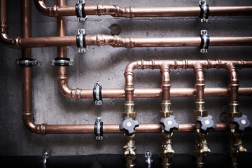Plumbing service. copper pipeline of a heating system in boiler room - 314049074