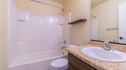 Panorama Small modern bathroom interior with marble vanity