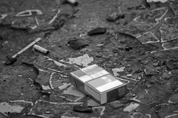 Pack of cigarettes on the ground 