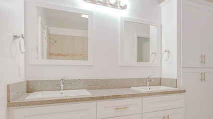 Fototapeta na wymiar Panorama frame Bright white bathroom with white towel