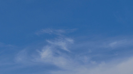 Fototapeta premium Fluffy white clouds on blue sky 