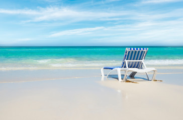 Deck chair on the tropical beach.