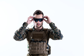 soldier preparing gear for action