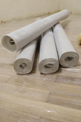 rolls of Wallpaper on the floor, repairs in the apartment, finishing the children's room, moving begins with the repair