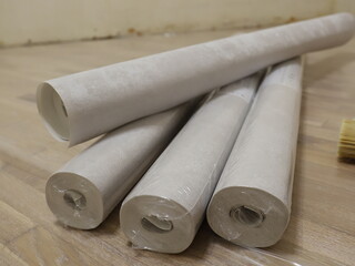 rolls of Wallpaper on the floor, repairs in the apartment, finishing the children's room, moving begins with the repair