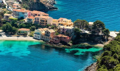 Panoramic spring seascape of Ionian Sea. Wonderful Sunny Day. Beautiful view over the sea beach in Assos village with colorful houses. Kefalonia island. Greece © jenyateua