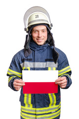 young smiling firefighter looking to the camera and holding paper sheet with polish flag
