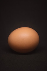 egg on black background