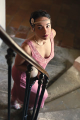 Lady in 1920s dress on staircase