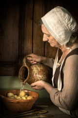 Renaissance portrait woman in kitchen