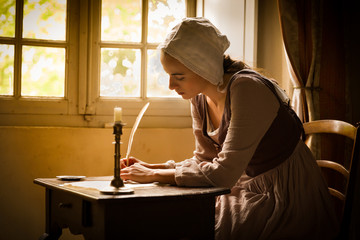 Vermeer woman writing letter