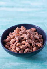 sugared almonds on a wooden surface