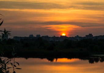 Beautiful sunset. Reflection in the river