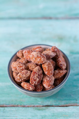 sugared almonds on a wooden surface