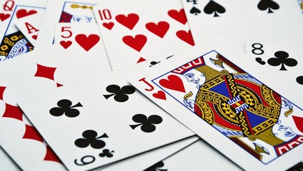 Close up of playing cards. Casino playing cards as background