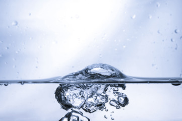  water splashes and air bubbles under water