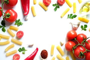 Clean healthy eating habits concept. Uncooked pasta, greens & vegetables mix and other vegan macaroni ingredients, white background. Vegetarian diet food. Flat lay, copy space