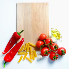 Clean healthy eating habits concept. Uncooked pasta, greens & vegetables mix and other vegan macaroni ingredients, white background. Vegetarian diet food. Flat lay, copy space