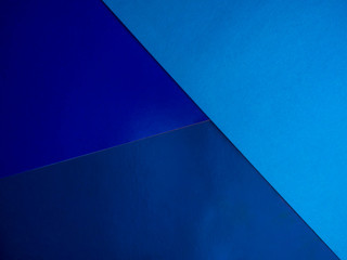 different blue paper geometric shapes made of paper. Color of the 2020 year. Trendy color concept.