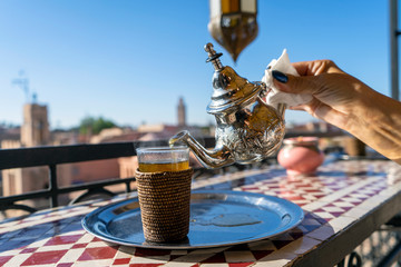 Enjoying moroccan tea on the roof top of Marrakech, Morocco