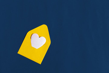 happy valentines dayyellow envelope on classic blue background