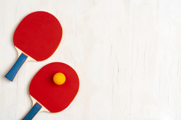 Ping pong equipment. Two rackets and ball, top view