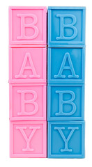 Pink and blue plastic baby blocks. isolated.